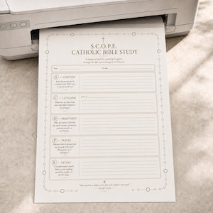 May include: A white paper sheet printed with a S.C.O.P.E. Catholic Bible Study template, featuring sections for Scripture, Catechism, Observation, Prayer, and Extras, with a decorative border and the text Your word is a lamp to my feet.