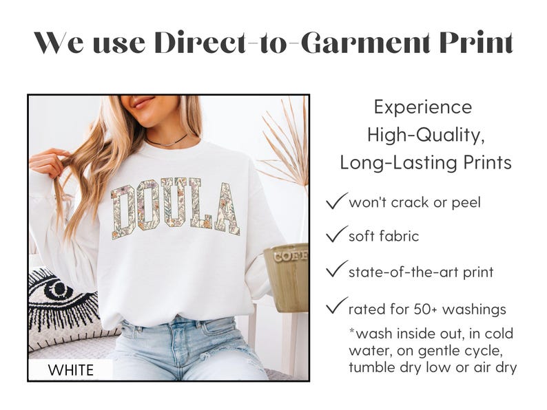May include: White sweatshirt with the word "DOULA" in a floral design. The image also includes text about direct-to-garment printing, highlighting features like soft fabric and long-lasting prints.