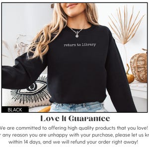May include: Black sweatshirt with the text "return to library" in white. The sweatshirt is a long-sleeved crewneck. The word "BLACK" is in a black rectangle at the bottom left of the image.