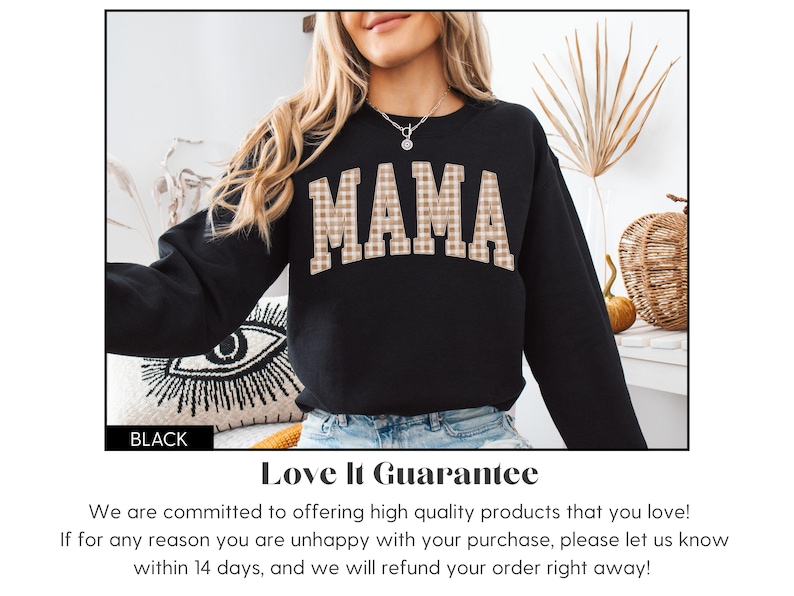 May include: Black sweatshirt with the word "MAMA" in a plaid pattern across the chest. The sweatshirt is part of a clothing collection. The word "BLACK" is in a black rectangle at the bottom left.