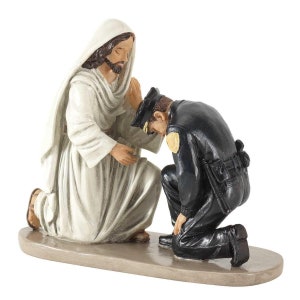 Figurine Jesus and Police Officer