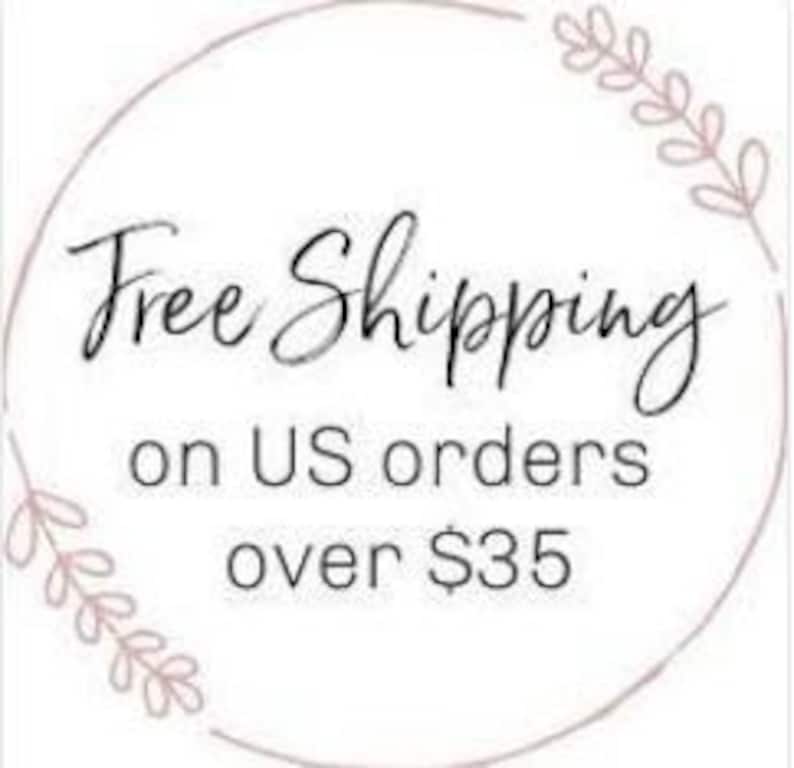 May include: Free shipping on US orders over $35.  A graphic with a floral wreath and the text "Free Shipping on US orders over $35".