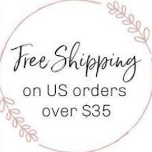 May include: Circular graphic with the words "Free Shipping" in elegant script, followed by "on US orders over $35". The design includes delicate floral accents around the circle's edge.