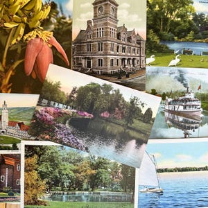 May include: A collection of vintage postcards featuring scenic views of a lake, a river, a town, and a building. The postcards are in various colors and have a worn, aged look.