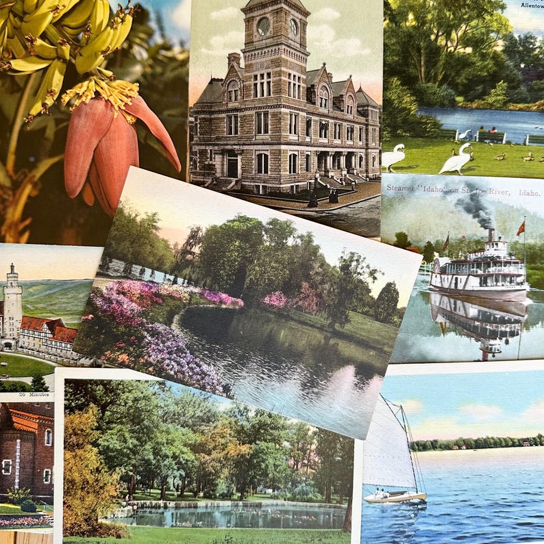 May include: A collection of vintage postcards featuring scenic views of a lake, a river, a town, and a building. The postcards are in various colors and have a worn, aged look.
