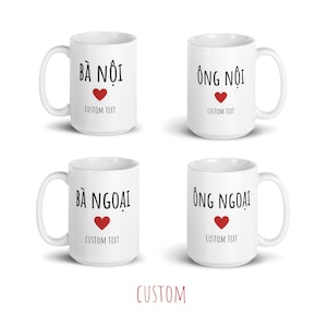 May include: Four white ceramic mugs with black text and a red heart. The mugs read "Bà Nội", "Ông Nội", "Bà Ngoại", and "Ông Ngoại". Each mug has the text "CUSTOM TEXT" below the heart.