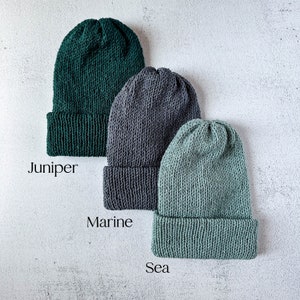 blue earth tone beanies