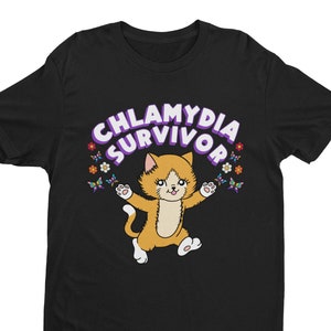 May include: Black t-shirt with a purple and white graphic of a cat with the text "Chlamydia Survivor" and colorful butterflies.