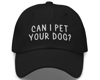 Może przedstawiać: Czarna czapka bejsbolówka z białym haftem z napisem "Can I pet your dog?"