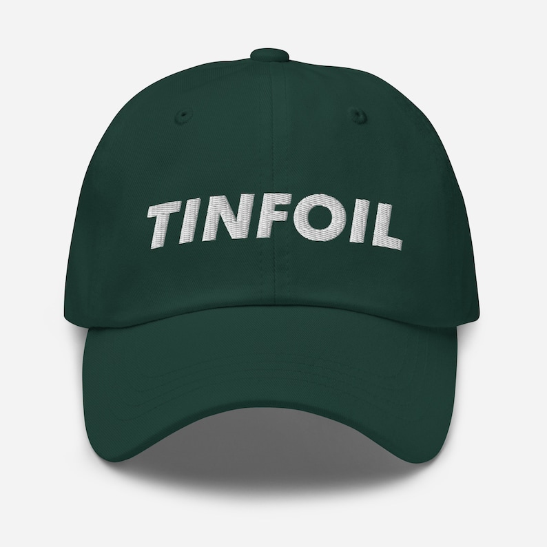 May include: A dark green baseball cap with the word "TINFOIL" embroidered in white on the front.