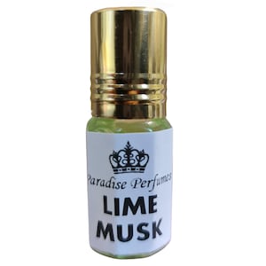 May include: A small glass bottle with a gold cap and a white label. The label features a crown and the text "Paradise Perfumes Lime Musk".