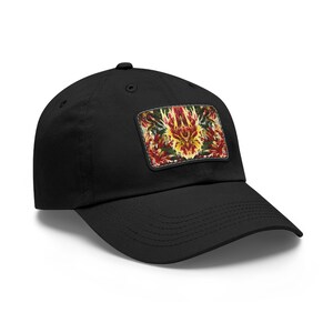 May include: Black baseball cap with a rectangular patch featuring a colorful floral design in red, yellow, and green. The cap has a curved brim and a button on top. A stylish accessory for any casual outfit.