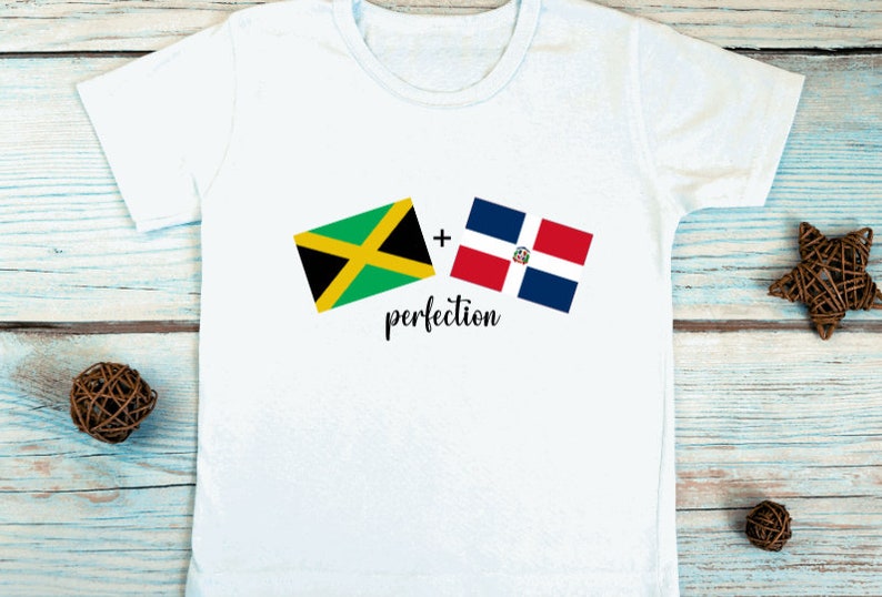 May include: White t-shirt with the flags of Jamaica and the Dominican Republic printed on it. The text " + perfection" is printed below the flags.