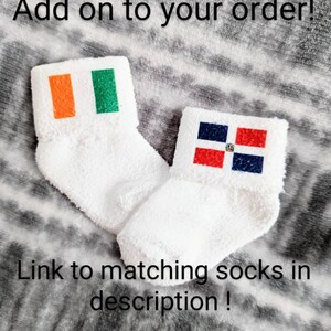 May include: Two pairs of white fuzzy socks with flags on them. The first pair has the flag of Ireland, and the second pair has the flag of the Dominican Republic. The text "Add on to your order!" is at the top of the image, and the text "Link to matching socks in description!" is at the bottom of the image.