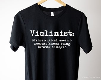 May include: Black t-shirt with white text that reads "Violinist: Divine musical maestro. Awesome human being. Creator of magic."