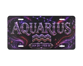 May include: A rectangular number plate featuring the word AQUARIUS in large, ornate, purple-toned lettering. Below the text is the Aquarius water-bearer symbol and the dates JAN 20 - FEB 18, set against a dark background with purple nebula swirls.
