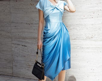 blue ombre satin dress Satin ombr dress in shades of blue light, elegant, and perfect for special occasions. A standout look that turns heads Discover more www.mindmatter.gr
