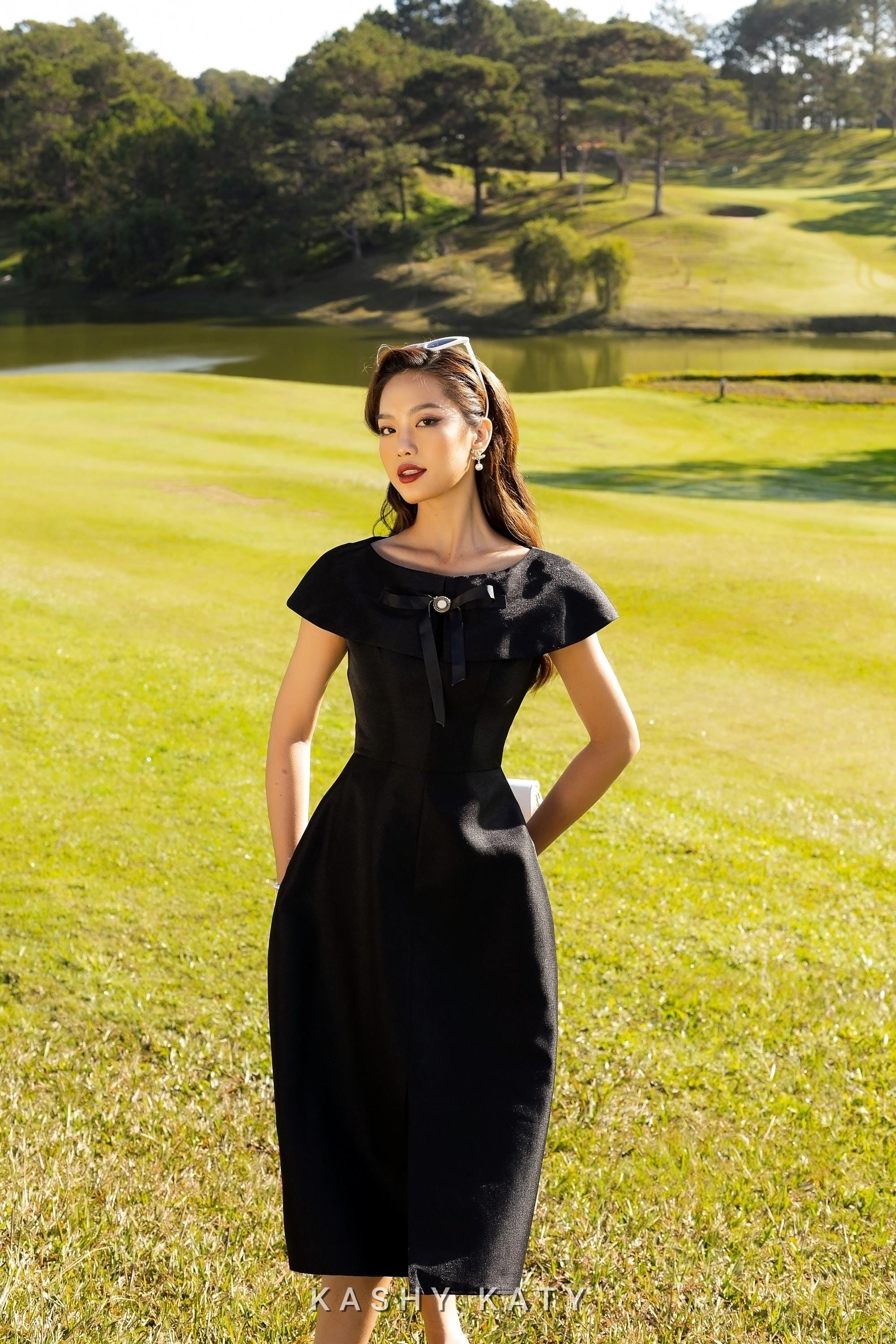 formal black dress with pearl necklace Women's Outfit: Black Sheath Dress, Black Leather Pumps, Black Sunglasses, White Pearl Necklace