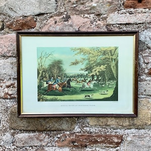English Period Fox Hunting Scene coloured print with Horses Hounds and Huntsman and Whips chasing foxes entitled ROYAL HUNT IN Windsor Park.