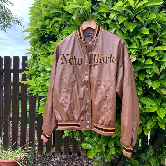 Faux leather top varsity jacket