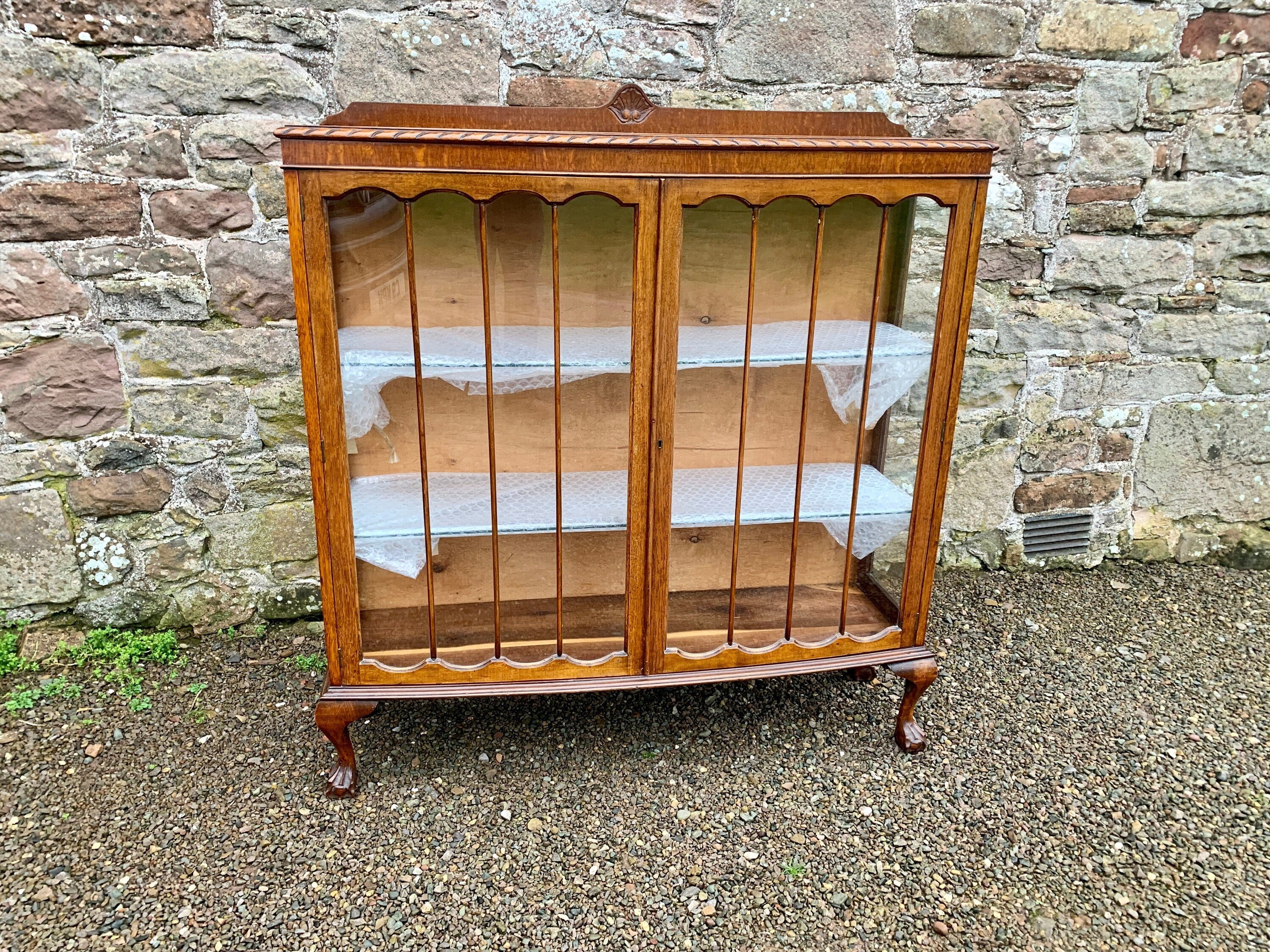 Antique bow sale front china cabinet
