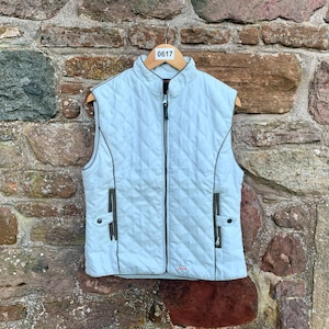 LADIES JOULES GILET - Very Light Duck Egg Blue Quilted Classic Country Equestrian Style Gilet, featuring two front zip and stud pockets