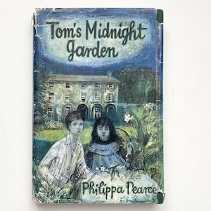 1958 Tom&#39;s Midnight Garden with unclipped dust jacket. First UK Edition. Becoming VERY RARE and therefore sought after. Beautiful Book.