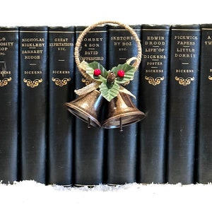 1890 - 1892 Large Format. The Works of Charles Dickens Bound in Eight Volumes. Pub.by Chapman and Hall Ltd. Blue and Gold.