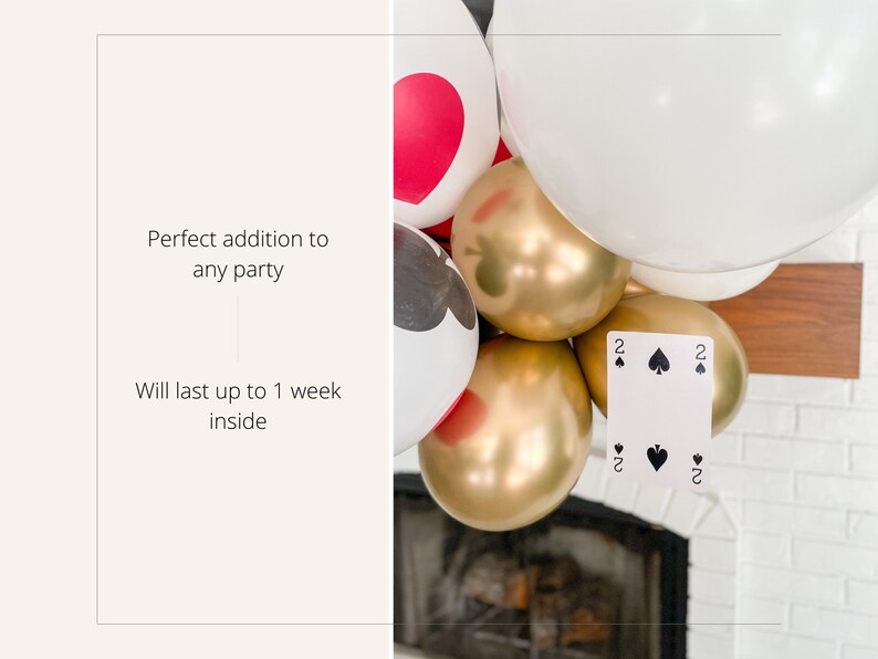 May include: A garland of balloons with a playing card attached. The balloons are white, gold, and red with black card suit symbols. The card is a two of spades.
