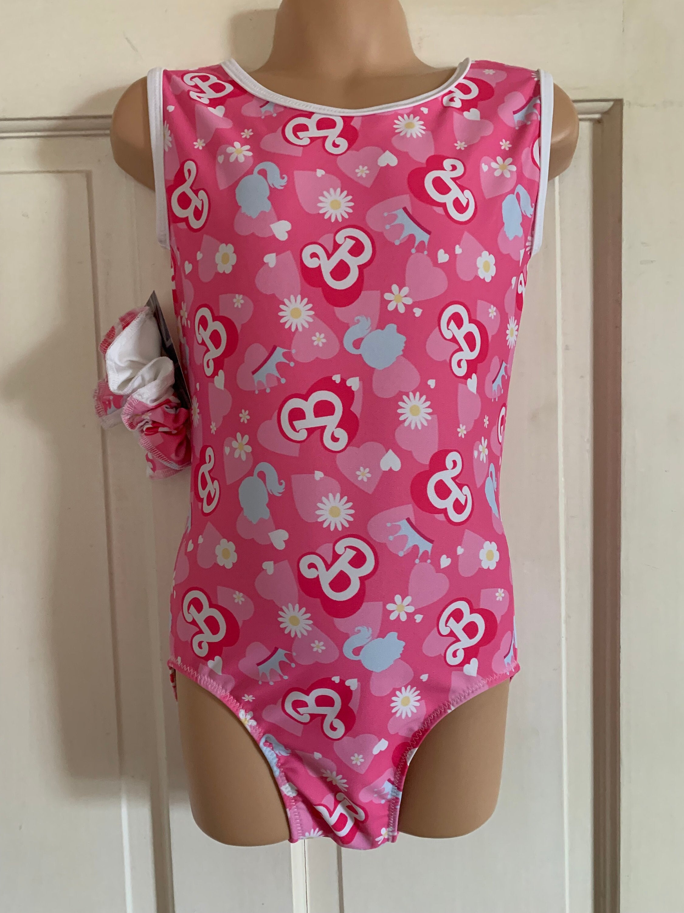 Girls gymnastics Barbie inspired pattern leotards , crop sets and hair scrunchies sizes 30, 28, 26, 24