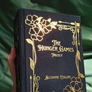 The Hunger Games Series | Includes Original Trilogy: The Hunger Games, Catching Fire, and Mockingjay, Special Edition Rebound Book