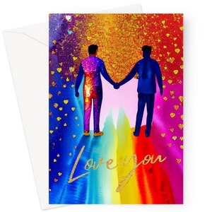 May include: A greeting card with a watercolor design featuring two figures holding hands against a rainbow background. The card has the words "Love you" in gold glitter script. The card is accompanied by a white envelope.