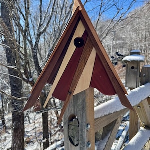 Beautiful unique hand made hardwood Birdhouse.