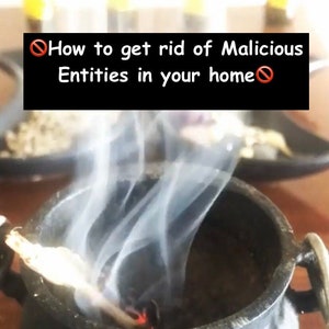 May include: A black cauldron with smoke rising from it. A wooden stick is burning inside the cauldron. The text "How to get rid of Malicious Entities in your home" is written in red letters on a black background. The Instagram handle "wiccanwitchempath" is visible in the bottom left corner of the image.