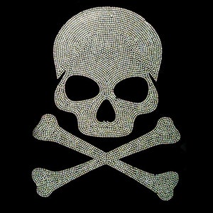 May include: A black background with a white skull and crossbones design made of rhinestones.