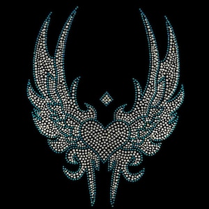 May include: A rhinestone design featuring a heart with wings. The heart and wings are outlined in turquoise rhinestones and filled with clear rhinestones.
