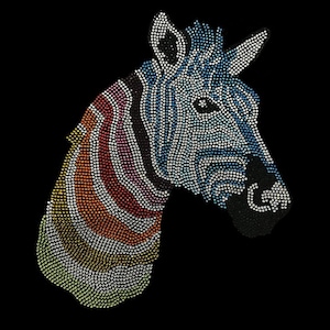 May include: A colorful zebra head made of rhinestones. The zebra's stripes are a rainbow of colors, including red, orange, yellow, green, blue, and purple. The zebra's head is facing to the right.