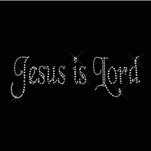 May include: A black background with the words "Jesus is Lord" spelled out in white rhinestones.