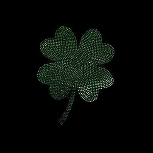 May include: A green four-leaf clover made of rhinestones on a black background.