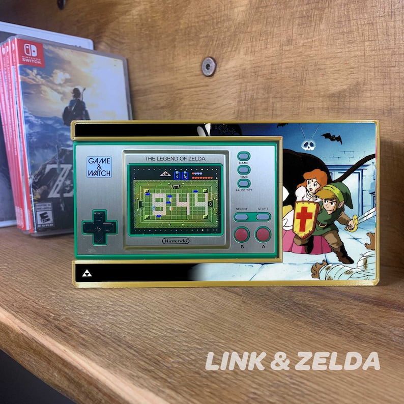 Proudly display your Game & Watch Zelda edition in your game room, garage or bedroom. Each shelf arrives with 3M Velcro Command Strips, instructions.