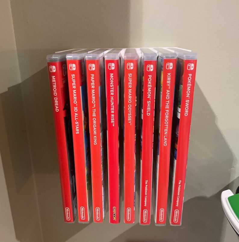 Slick, simple, slender. This Switch Game Shelf has it all – and mounts to your wall with included 3M Velcro Command Strips!