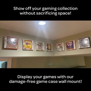 May include: A wall mounted display system for video game cases. The display is made of clear plastic and has a white frame. The cases are displayed in a row, with the game titles facing forward. The text "Show off your gaming collection without sacrificing space!" is at the top of the image. The text "Display your games with our damage-free game case wall mount!" is at the bottom of the image.