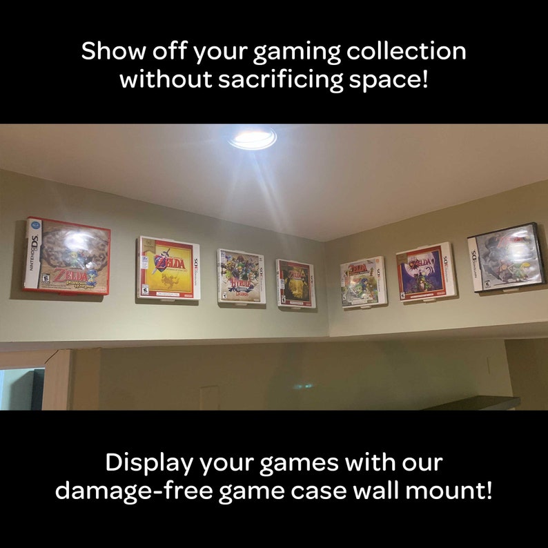 May include: A wall mounted display system for video game cases. The display is made of clear plastic and has a white frame. The cases are displayed in a row, with the game titles facing forward. The text "Show off your gaming collection without sacrificing space!" is at the top of the image. The text "Display your games with our damage-free game case wall mount!" is at the bottom of the image.