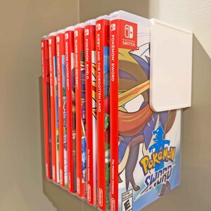 Slick, simple, slender. This Switch Game Shelf has it all – and mounts to your wall with included 3M Velcro Command Strips!