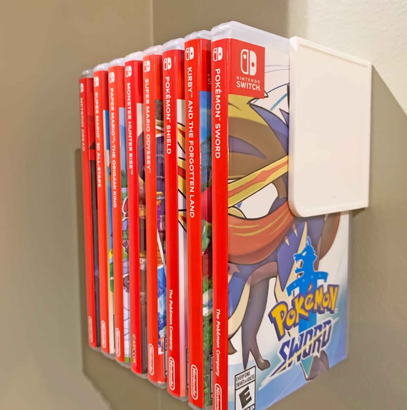 Slick, simple, slender. This Switch Game Shelf has it all – and mounts to your wall with included 3M Velcro Command Strips!