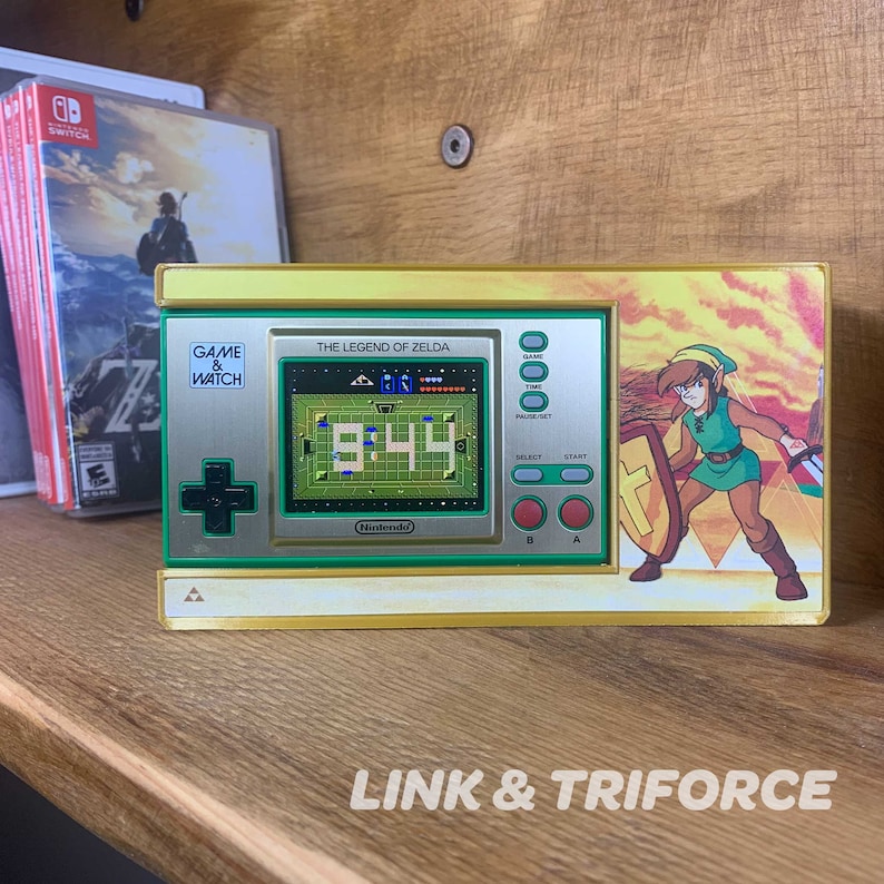 Proudly display your Game & Watch Zelda edition in your game room, garage or bedroom. Each shelf arrives with 3M Velcro Command Strips, instructions.
