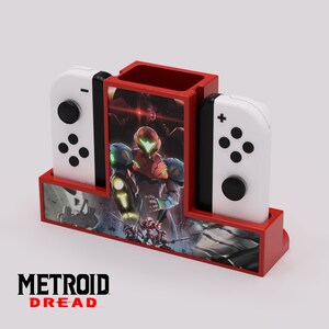Protect your precious JoyCons with this wall mounted JoyCon Stand! Includes your choice of Amiibo.
