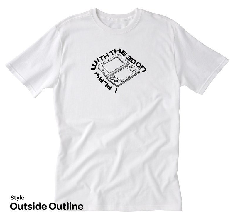 May include: White t-shirt with a black graphic of a Nintendo 3DS handheld gaming console and the text "I Play With The 3DS". The text is in a circle around the console.