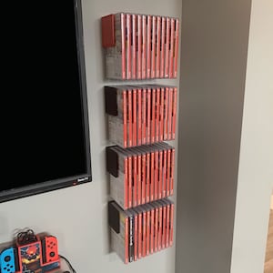 Flytande Nintendo Switch 1 & 2-spel med kommandoremsor | Väggmonterad organisation | FloatShelf bild 3