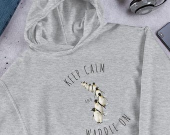 Sudadera con capucha de pingüinos marchando, bonito jersey de desfile de pingüinos, un caprichoso regalo de animales de invierno.